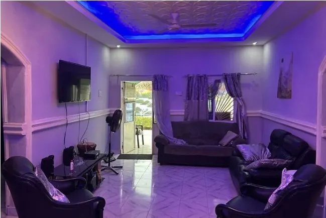 The same living room with blue evening lighting
